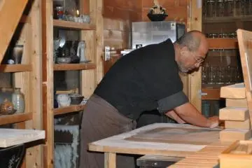 Rai-san preparing a fresh serving of noodles