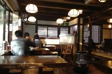 <p>Japanese style interior design with table and seats, or tatami mats. Whatever you choose, the warm atmosphere will surround you</p>
