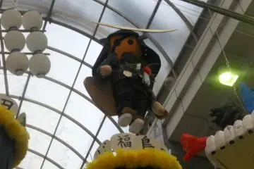 A paper version of lengendary samurai local Masumune Date on Clis Road in Downtown Sendai