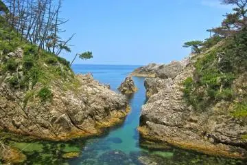 A small stream meets the Sea of Japan at this point