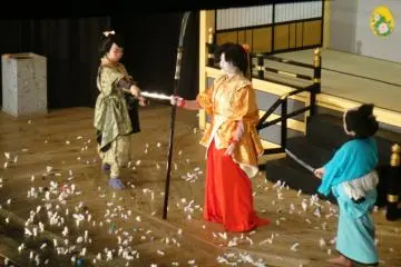 <p><span style="line-height: 20.8px;">The stage is filled with tissue wrapped money</span></p>
