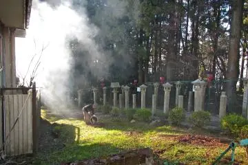 <p>Smoke and lanterns from a shrine near the summit</p>
