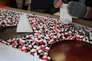 <p>A traditional Aizu good luck charm, called "okiagarikoboshi," which translates in English to "knock-down, stand-up small doll." Different colours denote different protections offered by the charm. Every year, locals buy the same number of charms as the members in their family, plus one additional one if they are hoping for a new child.</p>
