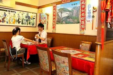 Faces of hungry travelers excited for their orders