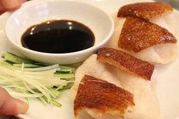 Donald Duck hates this dish... this is how his great great grandparents died... turned in to a Crispy Duck Skin dish... Thanks to the Chinese! Locals call this Peking duck.