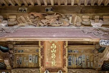 A close up of the inner roof reveals a dragon


