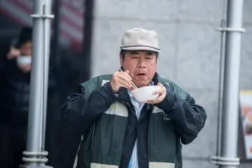 <p>Nabe lover enjoying every bite&nbsp;</p>
