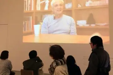 <p>A video loop of the architect.</p>
