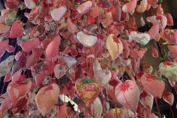 A massive collection of ornaments hangs in the center of the main exhibit hall.