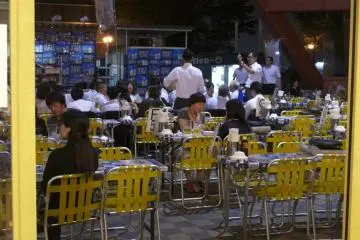 In the warmer months, an outdoor area at the base of the tower serves as a restaurant, with beer flowing and the smell of barbecue in the air.