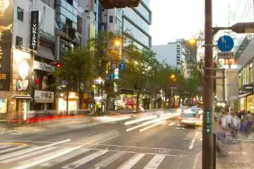 Tree-lined Kokutai-doro, on the southern side of Tenjin, has shopping, cafes, and restaurants