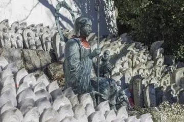 A Jizō Bodhisattva stands guard over the Mizuko