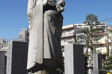 A statue watching over the graveyard