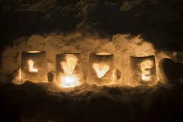 Snow lanterns read LOVE