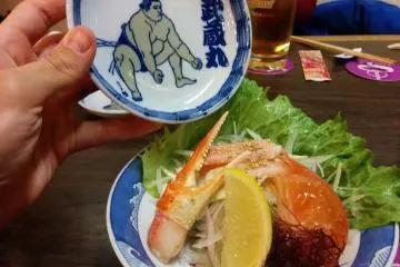 Fresh crab salad next to one of the restaurant specially designed bowls