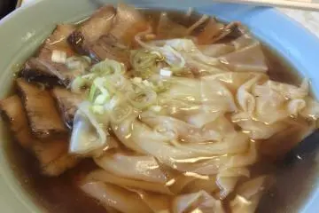 At a ramen shop on Nanokamachi Street that is well known for its unique dumpling ramen.