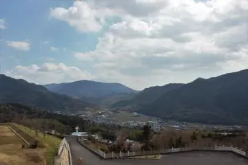A view from the grounds at the mountains and valley below