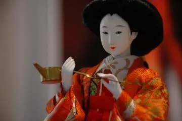 Close up of a doll at the information center.