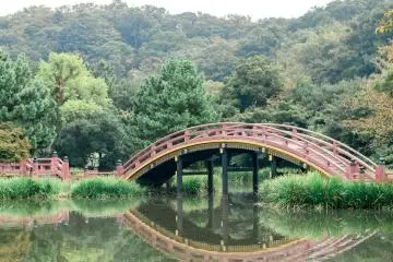 Jodo-style garden with red arched over the pond.