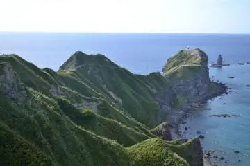 A spear of land stretches into the sea.