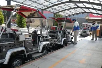 A family of four can take an ACRO-X car through obstacles on a track