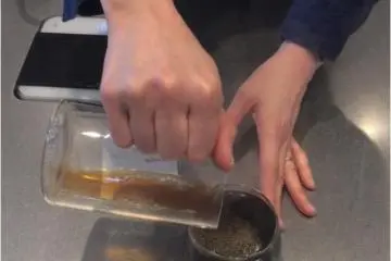 The barista poured the coffee for me after I came to the counter.