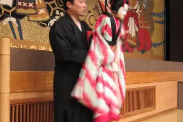 A puppeteer showing off his moves deftly 
