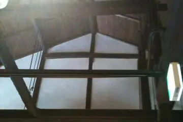 Open walls, high ceilings of the minka style interior.