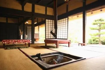 The irori fireplace is often lit to keep things cozy