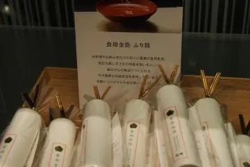 Chopsticks that drop gold shavings once broken apart.