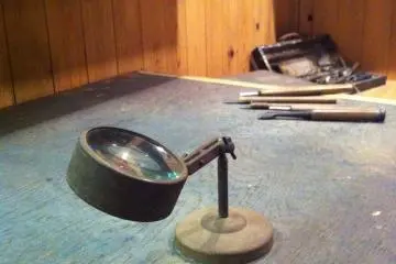 Azechi's magnifying glass and chisels