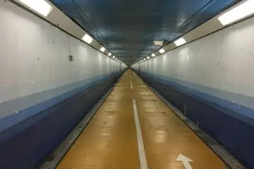 700m of tunnel to walk - it's slightly sloping. Cyclists have to get off and push their bikes. There were a lot of people jogging along this stretch