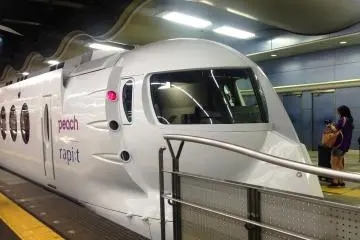 Nankai 50000 series in peach white to celebrate the launch of Peach Airlines