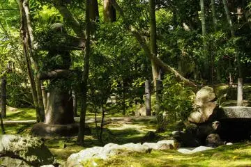 Traditional Japanese statues throughout.