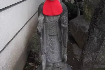 One of the statues at the gate
