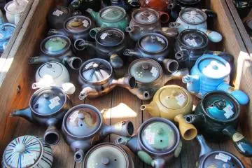 Teapots for sale at the market outside the museum.