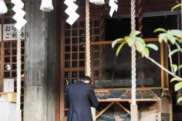 Praying.