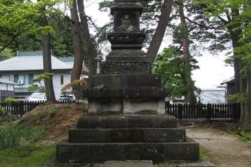 Statue to your right after gate two.