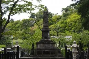 Statue to your left after gate two.