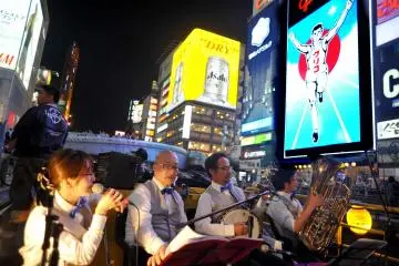 Stopping at the Glico Running Man