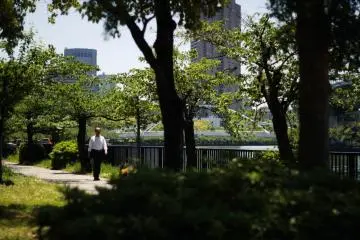 A man having a quiet moment while strolling