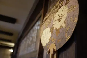 Beautiful patterns on a Japanese bamboo hand fan 