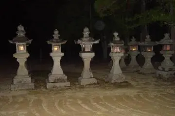 Row of lanterns at the Danjo Garan lit by night shed some magical light for late evening stroll through the sacred compound