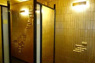 Golden screens and gold leaf-coated bricks and gold, gold, gold.