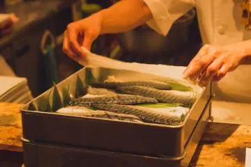 Chef getting the mackerel ready