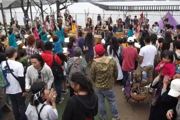 Members of Gocoo leading a drum workshop