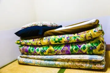  The extra mattress, plump pillows and thick futon will make sure you have a good sleep