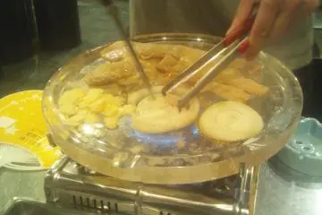 The grill is tilted so the grease runs off into a little trough