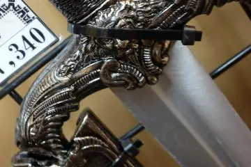 The detailed hilt of Victorian sword