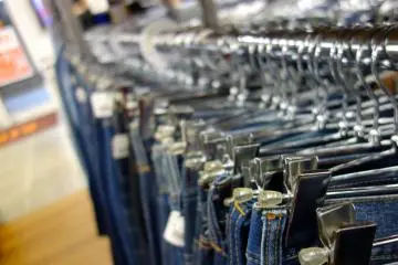 A rack of vintage jeans in one of the more commercial second-hand clothes stores